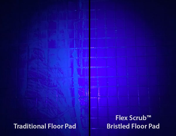 UV light on a floor split down the middle. One side was cleaned with traditional pads and the other with bristled floor pads.