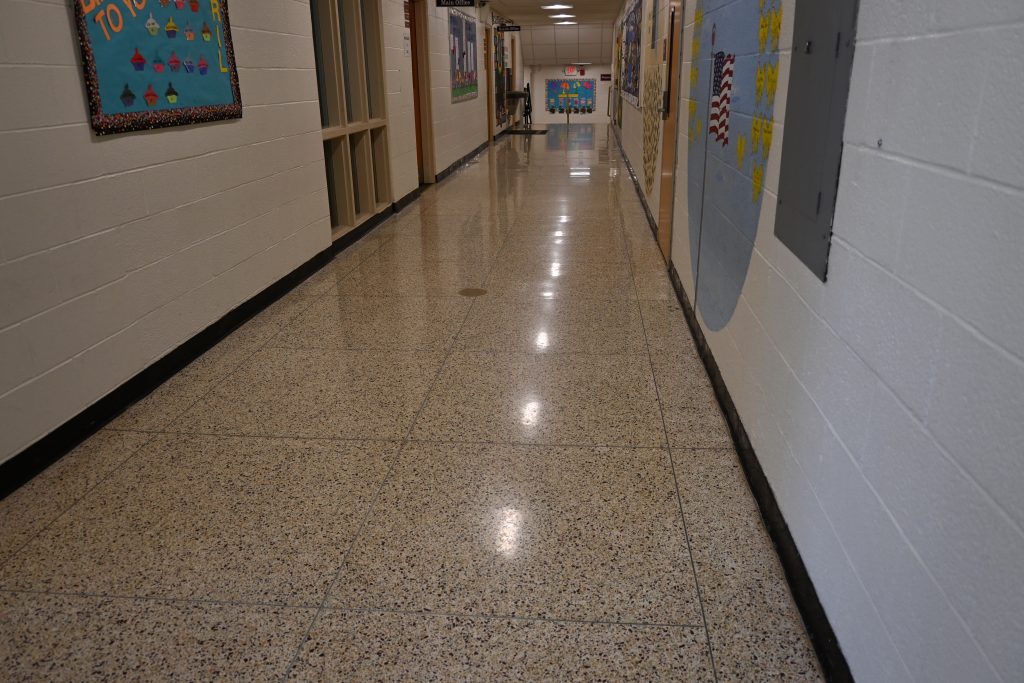 Bright, shiny polished terrazzo hallway