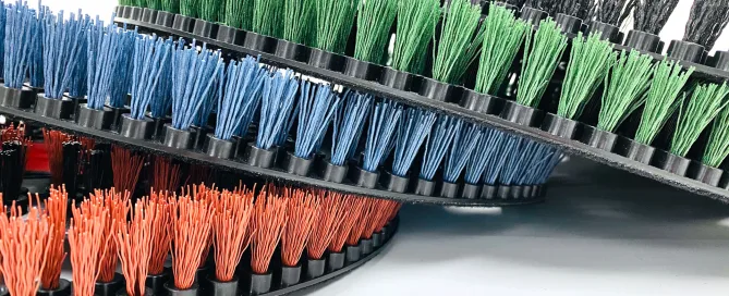 Flex Scrub Bristled Floor Pads stacked on each other Every Color