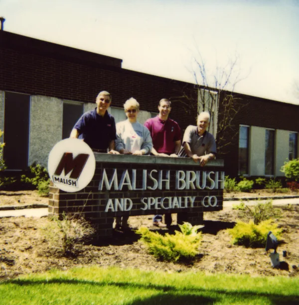 The Malish Family in front of the Malish headquarters in Willoughby